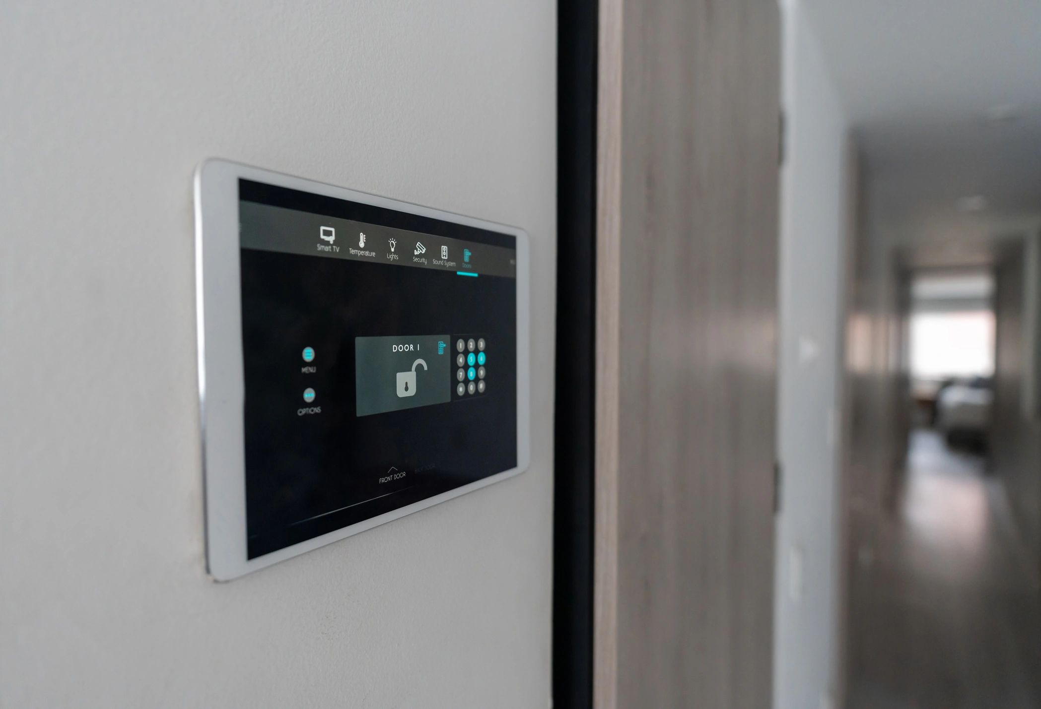 Access control keypad installed at a door entry point