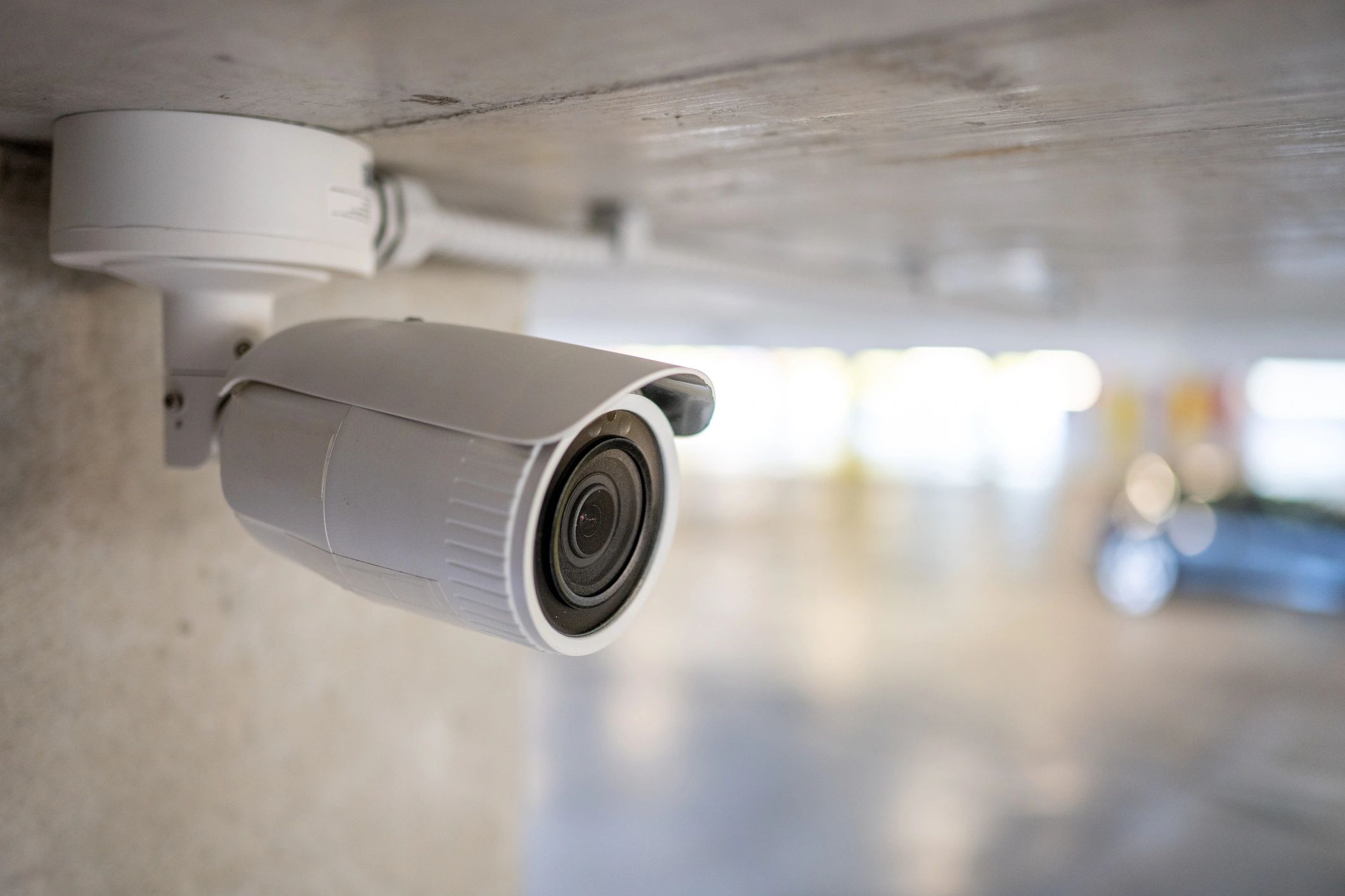 Close-up of a CCTV camera installed in a parking area