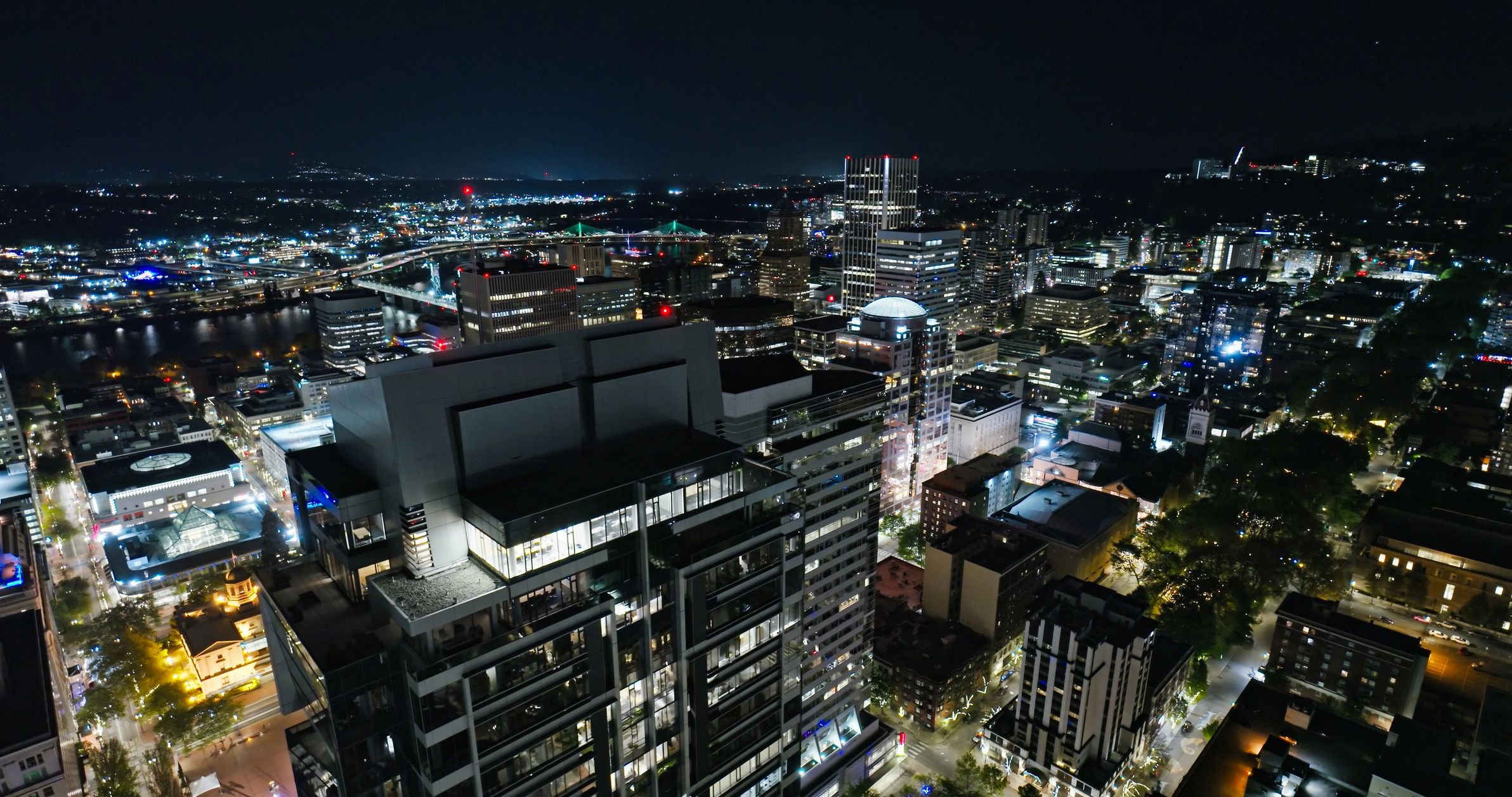 Commercial building at night representing secured properties